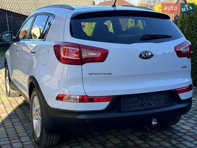 Білий Кіа Sportage, об'ємом двигуна 2 л та пробігом 223 тис. км за 14950 $, фото 16 на Automoto.ua