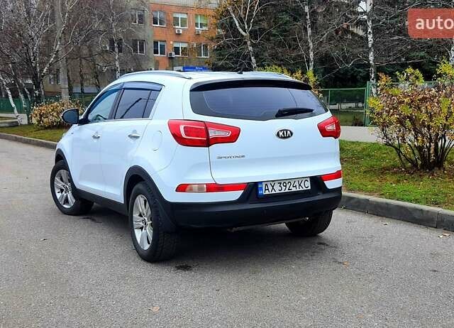 Білий Кіа Sportage, об'ємом двигуна 2 л та пробігом 102 тис. км за 14700 $, фото 6 на Automoto.ua