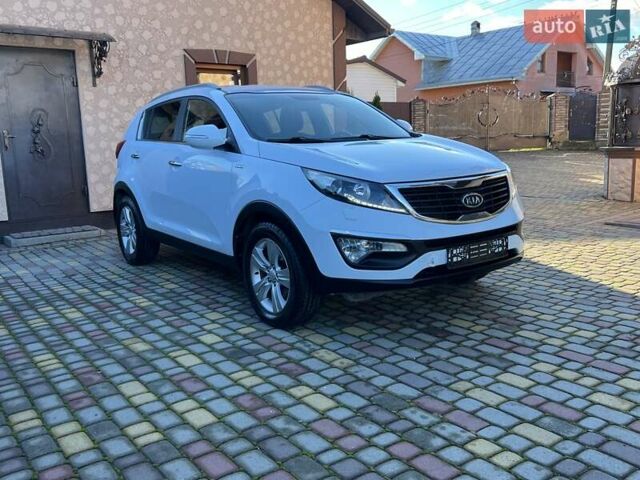 Білий Кіа Sportage, об'ємом двигуна 2 л та пробігом 223 тис. км за 14950 $, фото 67 на Automoto.ua