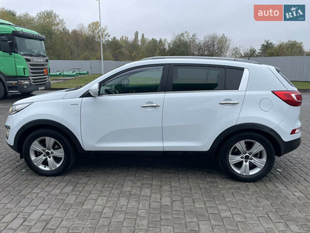 Білий Кіа Sportage, об'ємом двигуна 2 л та пробігом 234 тис. км за 13950 $, фото 7 на Automoto.ua