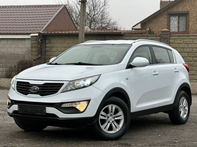 Білий Кіа Sportage, об'ємом двигуна 2 л та пробігом 121 тис. км за 12300 $, фото 3 на Automoto.ua