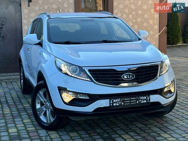 Білий Кіа Sportage, об'ємом двигуна 2 л та пробігом 223 тис. км за 14950 $, фото 46 на Automoto.ua