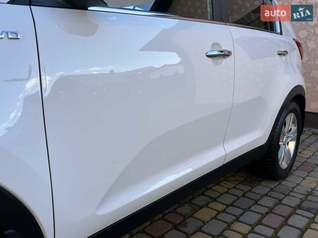 Білий Кіа Sportage, об'ємом двигуна 2 л та пробігом 223 тис. км за 14950 $, фото 60 на Automoto.ua