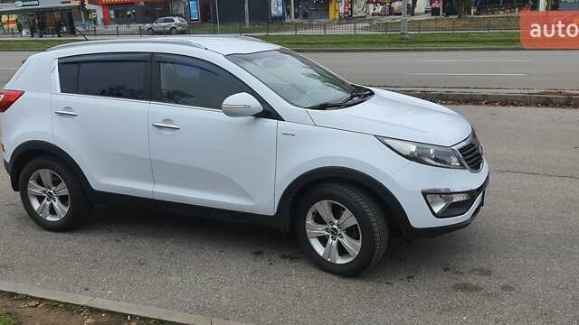 Білий Кіа Sportage, об'ємом двигуна 2 л та пробігом 102 тис. км за 14700 $, фото 10 на Automoto.ua