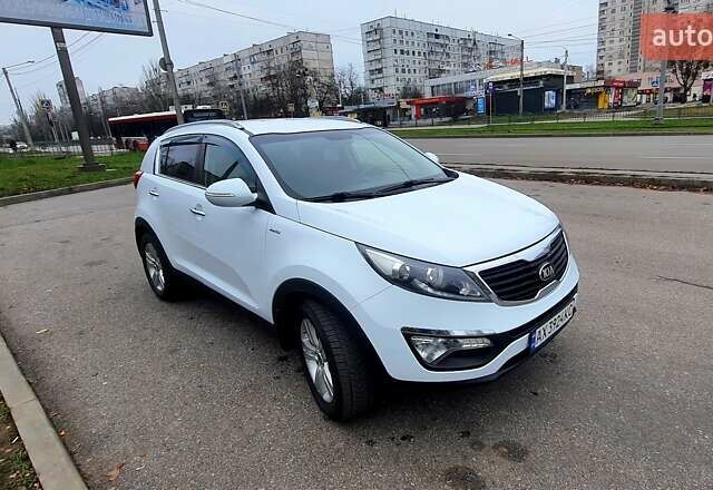 Білий Кіа Sportage, об'ємом двигуна 2 л та пробігом 102 тис. км за 14700 $, фото 16 на Automoto.ua
