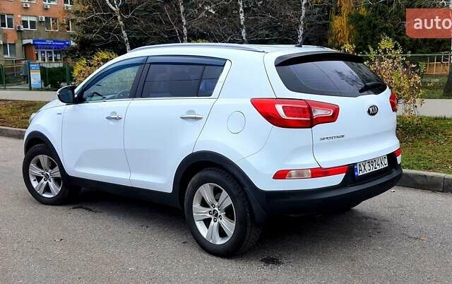 Білий Кіа Sportage, об'ємом двигуна 2 л та пробігом 102 тис. км за 14700 $, фото 7 на Automoto.ua