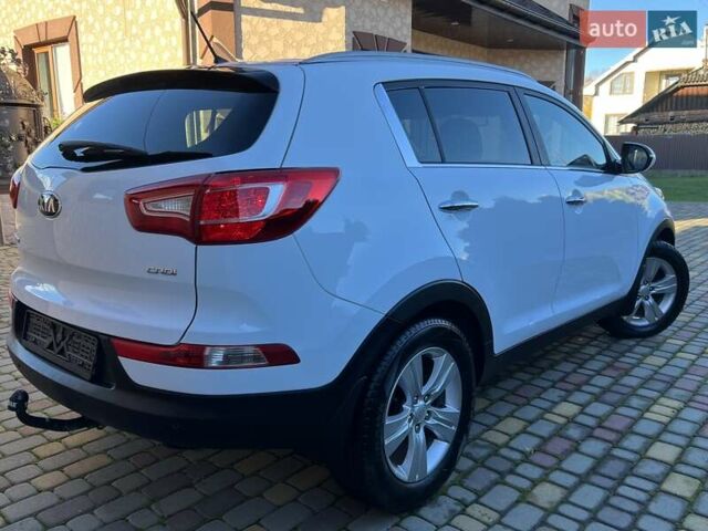 Білий Кіа Sportage, об'ємом двигуна 2 л та пробігом 223 тис. км за 14950 $, фото 49 на Automoto.ua