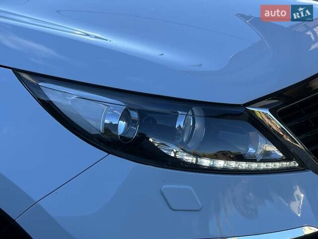 Білий Кіа Sportage, об'ємом двигуна 2 л та пробігом 223 тис. км за 14950 $, фото 34 на Automoto.ua