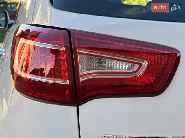 Білий Кіа Sportage, об'ємом двигуна 2 л та пробігом 223 тис. км за 14950 $, фото 38 на Automoto.ua