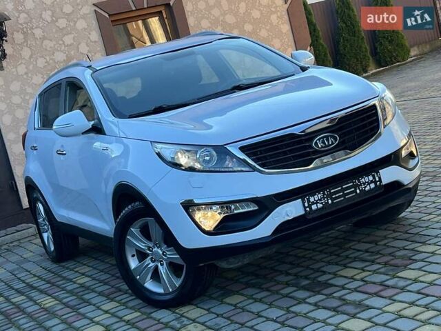 Білий Кіа Sportage, об'ємом двигуна 2 л та пробігом 223 тис. км за 14950 $, фото 47 на Automoto.ua