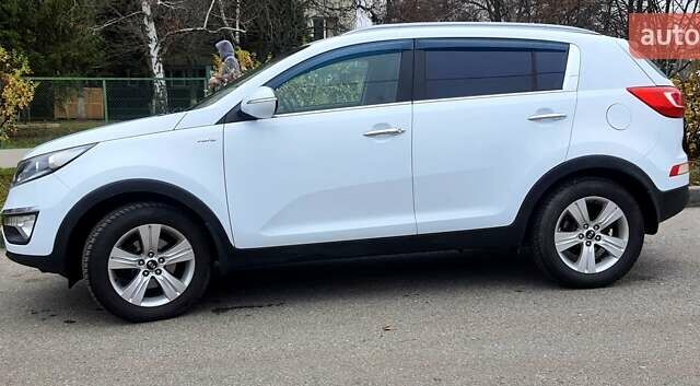 Білий Кіа Sportage, об'ємом двигуна 2 л та пробігом 102 тис. км за 14700 $, фото 2 на Automoto.ua