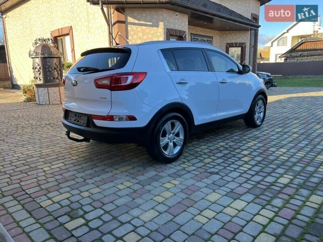 Білий Кіа Sportage, об'ємом двигуна 2 л та пробігом 223 тис. км за 14950 $, фото 68 на Automoto.ua