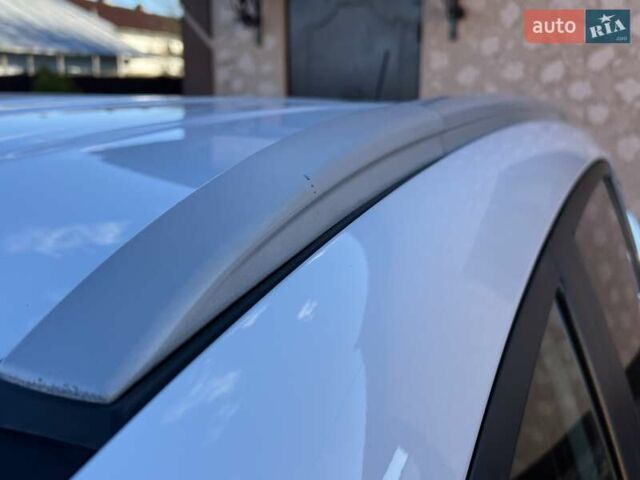 Білий Кіа Sportage, об'ємом двигуна 2 л та пробігом 223 тис. км за 14950 $, фото 43 на Automoto.ua