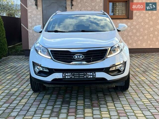 Білий Кіа Sportage, об'ємом двигуна 2 л та пробігом 223 тис. км за 14950 $, фото 4 на Automoto.ua
