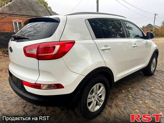Белый Киа Sportage, объемом двигателя 2 л и пробегом 150 тыс. км за 9750 $, фото 4 на Automoto.ua