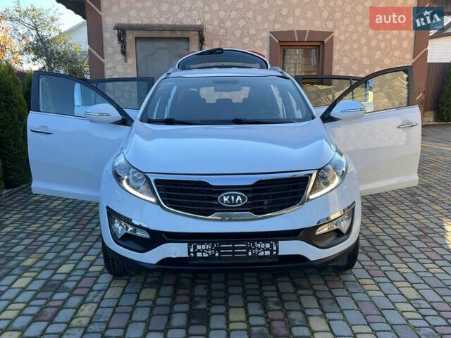 Білий Кіа Sportage, об'ємом двигуна 2 л та пробігом 223 тис. км за 14950 $, фото 69 на Automoto.ua