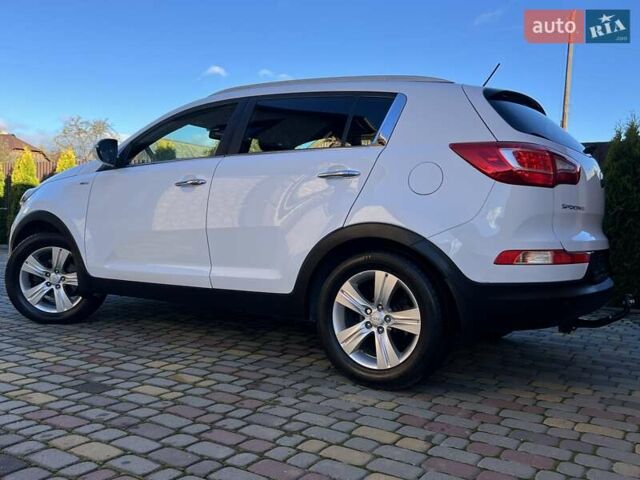 Білий Кіа Sportage, об'ємом двигуна 2 л та пробігом 223 тис. км за 14950 $, фото 53 на Automoto.ua