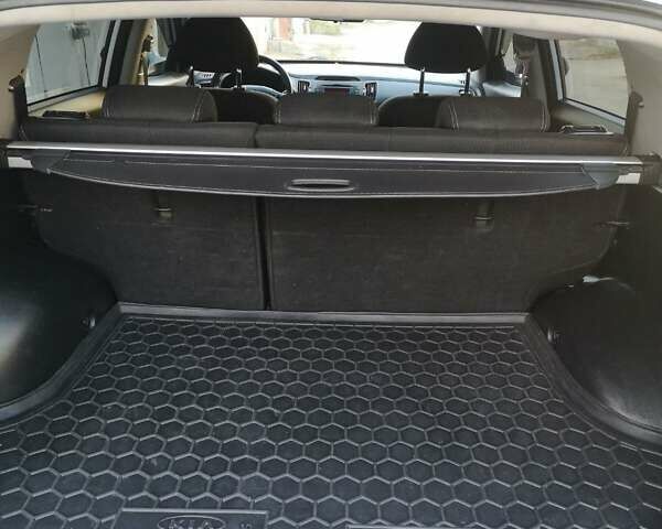 Білий Кіа Sportage, об'ємом двигуна 2 л та пробігом 198 тис. км за 12900 $, фото 16 на Automoto.ua