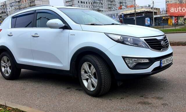 Білий Кіа Sportage, об'ємом двигуна 2 л та пробігом 102 тис. км за 14700 $, фото 12 на Automoto.ua
