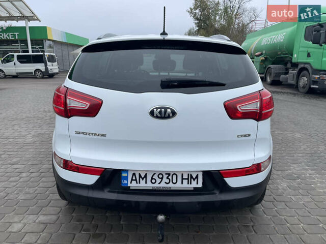 Білий Кіа Sportage, об'ємом двигуна 2 л та пробігом 234 тис. км за 13950 $, фото 5 на Automoto.ua