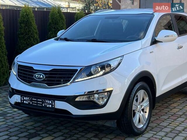 Білий Кіа Sportage, об'ємом двигуна 2 л та пробігом 223 тис. км за 14950 $, фото 55 на Automoto.ua