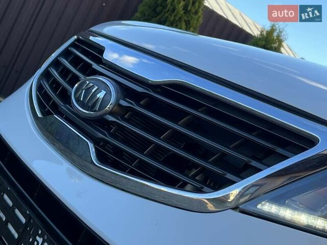 Білий Кіа Sportage, об'ємом двигуна 2 л та пробігом 223 тис. км за 14950 $, фото 30 на Automoto.ua