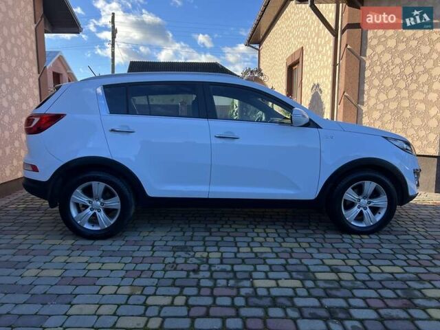 Білий Кіа Sportage, об'ємом двигуна 2 л та пробігом 223 тис. км за 14950 $, фото 1 на Automoto.ua