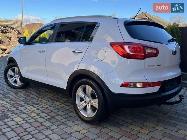 Білий Кіа Sportage, об'ємом двигуна 2 л та пробігом 223 тис. км за 14950 $, фото 50 на Automoto.ua