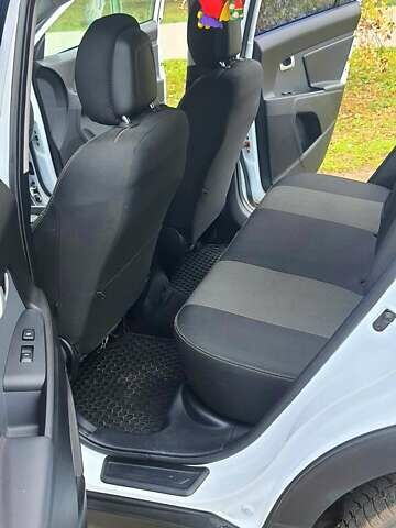 Білий Кіа Sportage, об'ємом двигуна 2 л та пробігом 102 тис. км за 14700 $, фото 21 на Automoto.ua