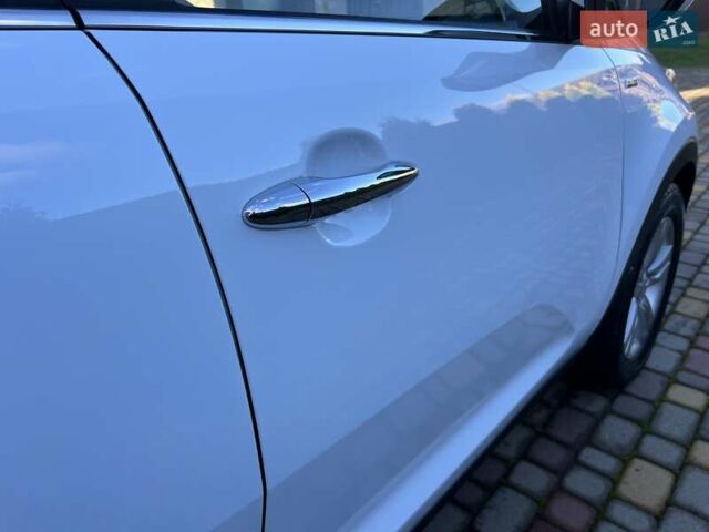 Білий Кіа Sportage, об'ємом двигуна 2 л та пробігом 223 тис. км за 14950 $, фото 25 на Automoto.ua