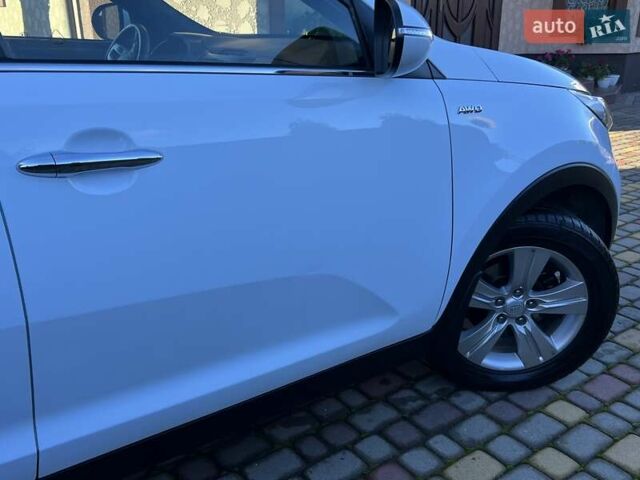 Білий Кіа Sportage, об'ємом двигуна 2 л та пробігом 223 тис. км за 14950 $, фото 64 на Automoto.ua
