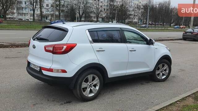 Білий Кіа Sportage, об'ємом двигуна 2 л та пробігом 102 тис. км за 14700 $, фото 13 на Automoto.ua