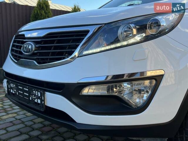 Білий Кіа Sportage, об'ємом двигуна 2 л та пробігом 223 тис. км за 14950 $, фото 29 на Automoto.ua