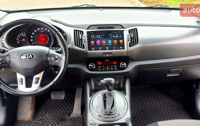 Білий Кіа Sportage, об'ємом двигуна 2 л та пробігом 102 тис. км за 14700 $, фото 22 на Automoto.ua