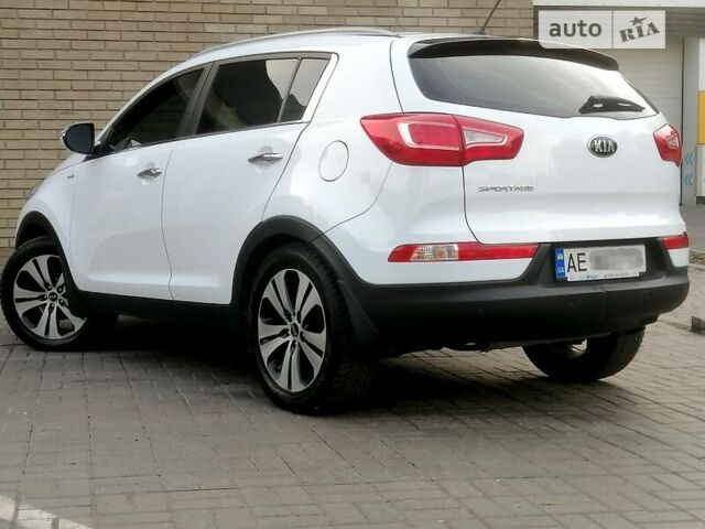 Білий Кіа Sportage, об'ємом двигуна 2 л та пробігом 102 тис. км за 13800 $, фото 12 на Automoto.ua