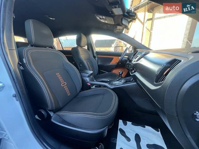 Білий Кіа Sportage, об'ємом двигуна 2 л та пробігом 223 тис. км за 14950 $, фото 109 на Automoto.ua