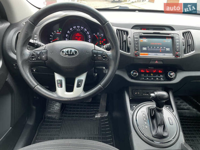 Білий Кіа Sportage, об'ємом двигуна 2 л та пробігом 234 тис. км за 13950 $, фото 10 на Automoto.ua