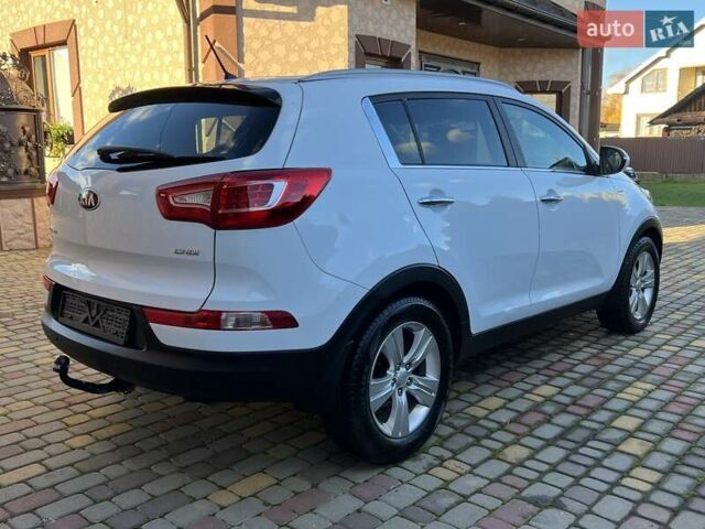 Білий Кіа Sportage, об'ємом двигуна 2 л та пробігом 223 тис. км за 14950 $, фото 6 на Automoto.ua