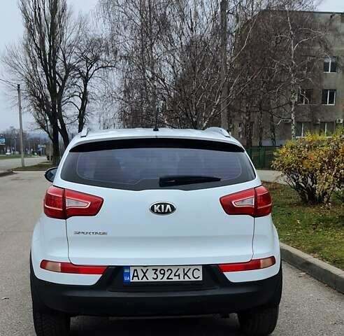 Білий Кіа Sportage, об'ємом двигуна 2 л та пробігом 102 тис. км за 14700 $, фото 5 на Automoto.ua