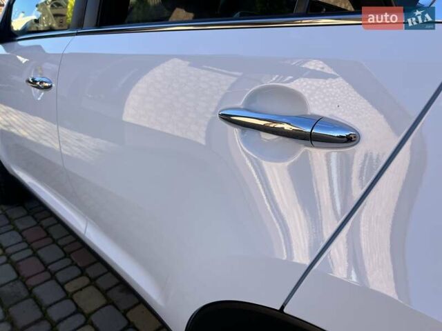Білий Кіа Sportage, об'ємом двигуна 2 л та пробігом 223 тис. км за 14950 $, фото 19 на Automoto.ua