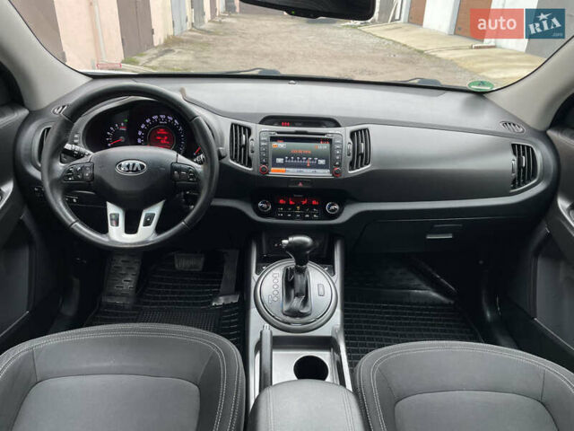 Білий Кіа Sportage, об'ємом двигуна 2 л та пробігом 234 тис. км за 13950 $, фото 8 на Automoto.ua