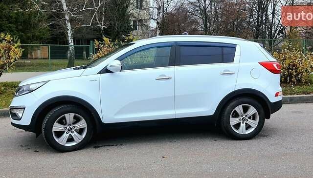 Білий Кіа Sportage, об'ємом двигуна 2 л та пробігом 102 тис. км за 14700 $, фото 3 на Automoto.ua