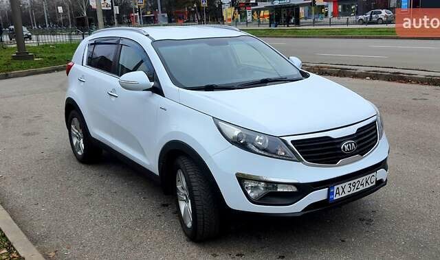Білий Кіа Sportage, об'ємом двигуна 2 л та пробігом 102 тис. км за 14700 $, фото 9 на Automoto.ua