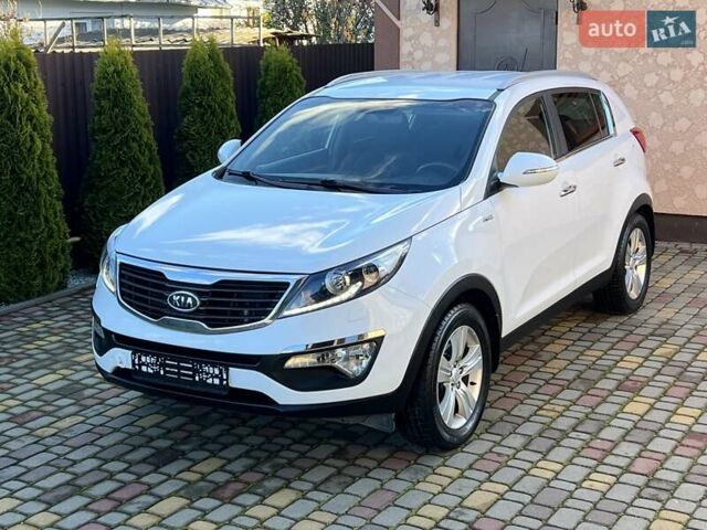 Білий Кіа Sportage, об'ємом двигуна 2 л та пробігом 223 тис. км за 14950 $, фото 12 на Automoto.ua