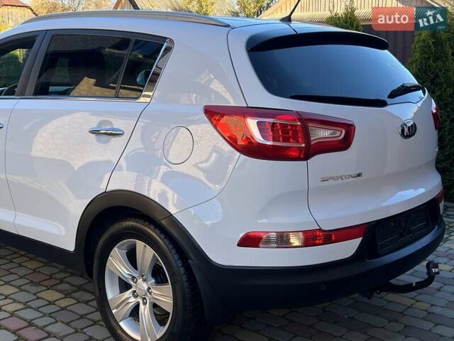 Білий Кіа Sportage, об'ємом двигуна 2 л та пробігом 223 тис. км за 14950 $, фото 56 на Automoto.ua