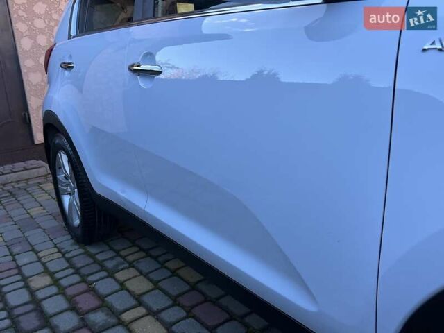 Білий Кіа Sportage, об'ємом двигуна 2 л та пробігом 223 тис. км за 14950 $, фото 63 на Automoto.ua