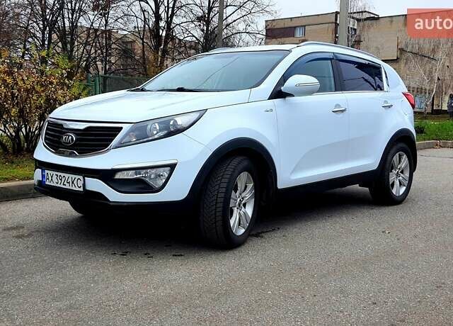 Білий Кіа Sportage, об'ємом двигуна 2 л та пробігом 102 тис. км за 14700 $, фото 4 на Automoto.ua