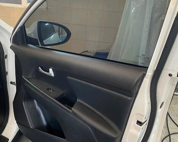 Белый Киа Sportage, объемом двигателя 2.4 л и пробегом 143 тыс. км за 12200 $, фото 11 на Automoto.ua