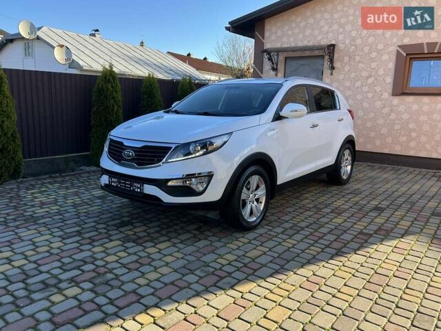Білий Кіа Sportage, об'ємом двигуна 2 л та пробігом 223 тис. км за 14950 $, фото 66 на Automoto.ua