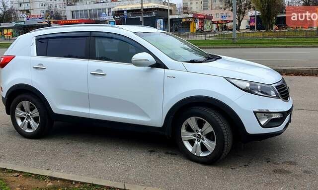 Білий Кіа Sportage, об'ємом двигуна 2 л та пробігом 102 тис. км за 14700 $, фото 11 на Automoto.ua